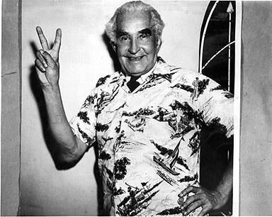 Sir Alexander Bustamante showing his party sign [date unknown]