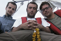 Three men on a boat