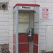 Old red and metal phone booth