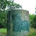 Smaller water tower tank at the top of the hill