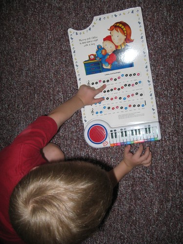 Playing with new piano book