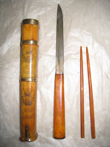 Souvenir: Knife and chopsticks (made of yak bone) from Tibet
