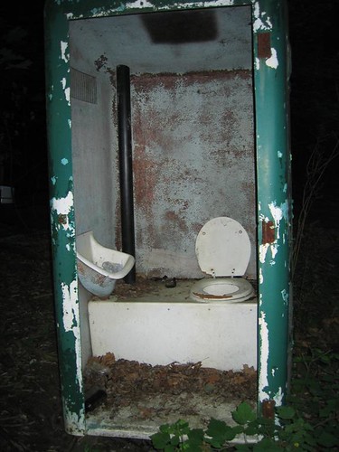 Old port-a-potty in the woods
