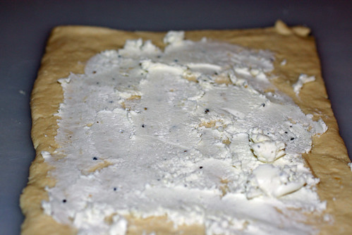 dough with goat cheese spread