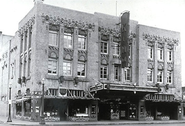 A vintage image of the KiMo Theatre in Albuquerque, including its original neon sign.