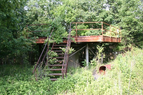 Missile launch pad overgrown with weeds