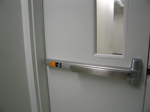 Active alarmed push door in the biotech center