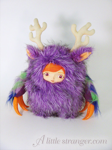 Purple and orange super fluffy yeti monster 