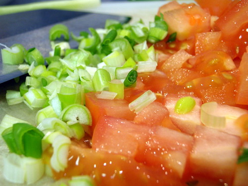 Chopped scallions and tomatoes