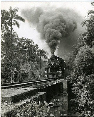 The Jamaican Railway Corporation engine 54, on its last run entering May Pen, Clarendon, 1968