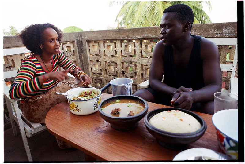Togo West Africa Fouzia Eating Fufu and Goat Head Soup Village close to Palimé formerly known as Kpalimé is a city in Plateaux Region Togo near the Ghanaian border 23 April 1999 027<br/>© <a href="https://flickr.com/people/41087279@N00" target="_blank" rel="nofollow">41087279@N00</a> (<a href="https://flickr.com/photo.gne?id=3278270162" target="_blank" rel="nofollow">Flickr</a>)