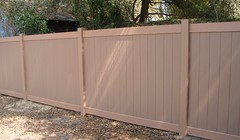 Woodgrain privacy vinyl fence