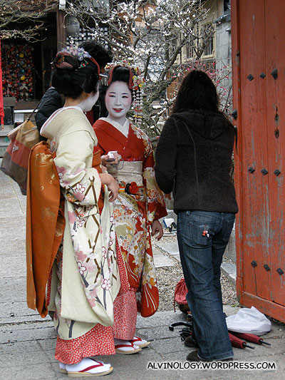 Geishas getting dressed