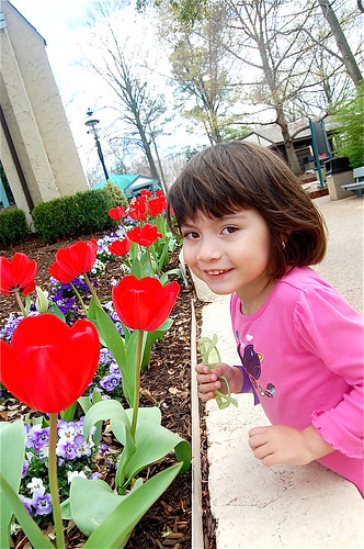 Taking a moment to smell the tulips. The landscaping is beautiful!