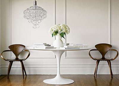 White + wood: Saarinen Tulip table + mid-century modern Norman Cherner chairs