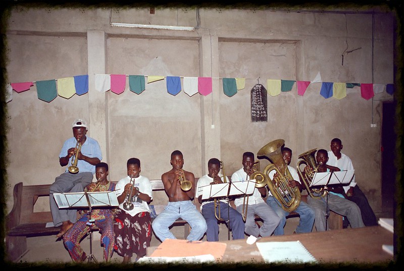 Togo West Africa Local Ethnic Cultural Orchestra Band and Show African Village close to Palimé formerly known as Kpalimé a city in Plateaux Region Togo near the Ghanaian border 23 April 1999 023 Local Brass Band<br/>© <a href="https://flickr.com/people/41087279@N00" target="_blank" rel="nofollow">41087279@N00</a> (<a href="https://flickr.com/photo.gne?id=3278243460" target="_blank" rel="nofollow">Flickr</a>)