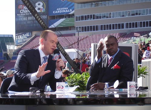 It was hot enough on Media Day morning that Marshall Faulk had to wipe his brow.