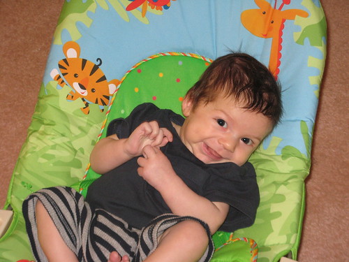 Finn in his bouncy seat, happy!