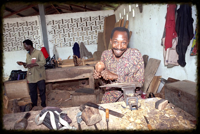 Togo West Africa Ethnic Cultural Wood Carvings Palimé formerly known as Kpalimé is a city in Plateaux Region Togo near the Ghanaian border 23 April 1999 001 African Wood Craft Worker<br/>© <a href="https://flickr.com/people/41087279@N00" target="_blank" rel="nofollow">41087279@N00</a> (<a href="https://flickr.com/photo.gne?id=3277341283" target="_blank" rel="nofollow">Flickr</a>)