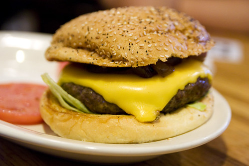 burger with american cheese and grilled onions