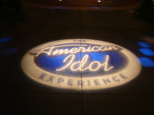 The Idol logo projected on the ground during the after-party. Photo by Mark Goldhaber.