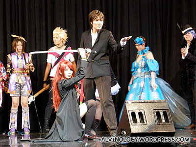 A cosplay group participating in the cosplay competition on stage
