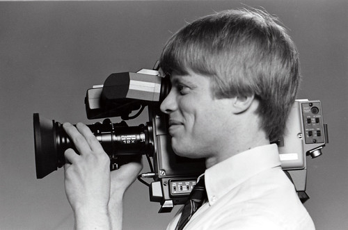 man with video camera by woodleywonderworks.