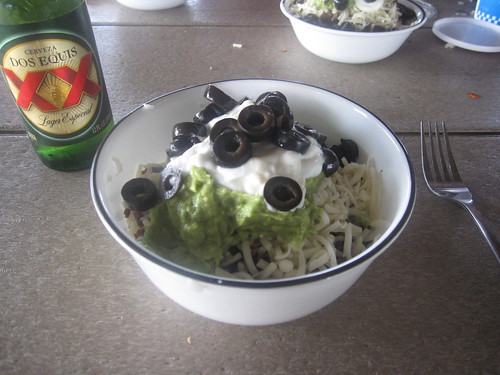 Finished burrito bowl - enjoyed with a Dos Equis XX