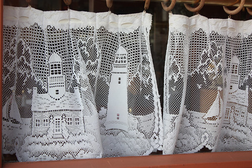 Lighthouse lace curtains in a cafe in Provincetown