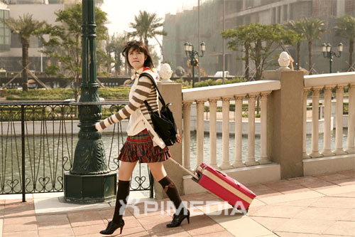 Jan Di with her luggage at The Venetian Macau