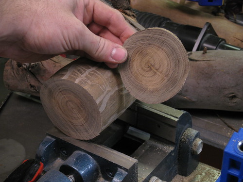 small end removed while cutting the log to roughly 90°