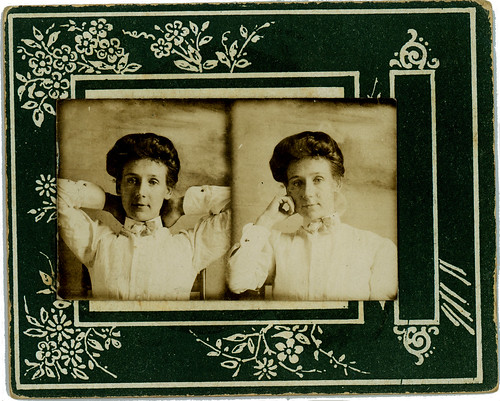 two photobooth portraits mounted on one card
