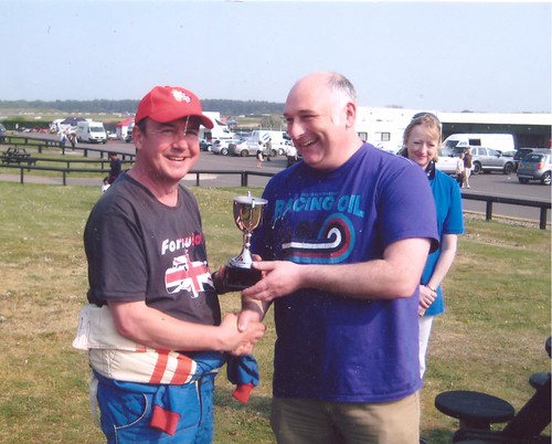 John Griffiths receiving his trophy from Philip Clay
