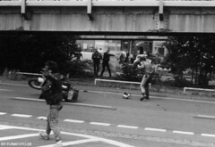 The next day at the Chaos Days in Hannover, 04.08.1984. the cop already gets stones being thrown at him, in the front you still see someone of the GDHC guys! photographer unknown