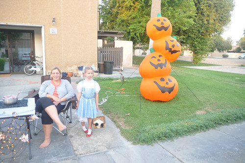 Outside with the Pumpkins.   Bought a decade ago at Walmart it is now a local attraction. • <a style="font-size:0.8em;" href="http://www.flickr.com/photos/96277117@N00/10863162794/" target="_blank">View on Flickr</a>