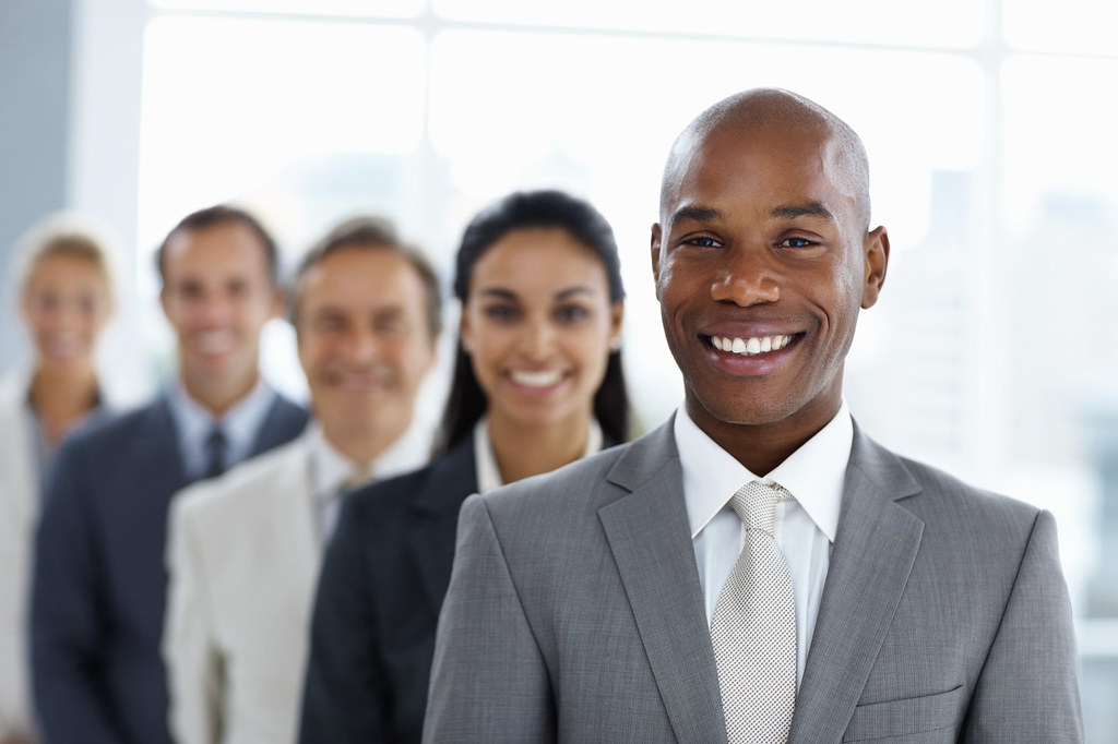 Image result for black man happy with colleagues
