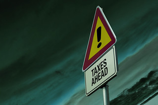 Warning sign of 'Taxes Ahead'