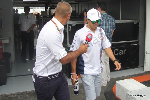 Felipe Massa returns from the drivers' parade at the 2014 German Grand Prix