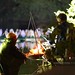 Moseley Folk Festival 2014, men chatting around their fire