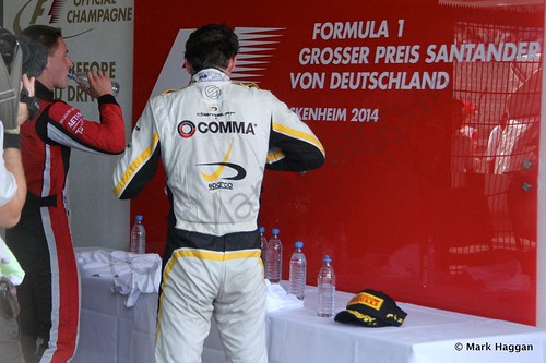 Jolyon Palmer and Stoffel Vandoorne prepare for the podium after the first GP2 race at the 2014 German Grand Prix