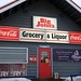Big John's Grocery & Liquor, Beer Cave Entrance, Kassik's, Bear Creek, Coca-Cola, we I.D., Sterling Highway, Sterling, Kenai Penisula, Alaska, USA