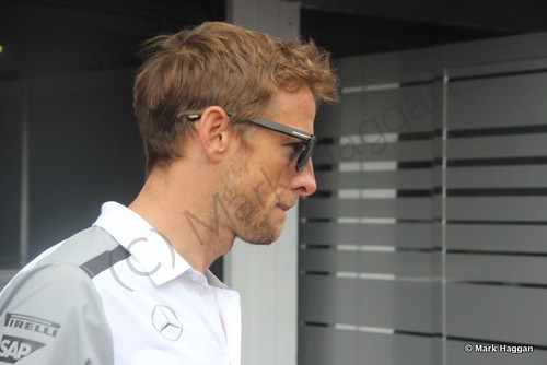 Jenson Button returns from the drivers' parade at the 2014 German Grand Prix