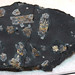 Cherry blossom stones (pinite) in hornfels (mid-Cretaceous, 98 Ma; Mikata, Honshu Island, Japan) 1