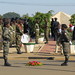 Female military police officers flank a wreath in the middle of a roundabout in Chimoio, Mozambique • <a style="font-size:0.8em;" href="http://www.flickr.com/photos/50948792@N02/14417193303/" target="_blank">View on Flickr</a>