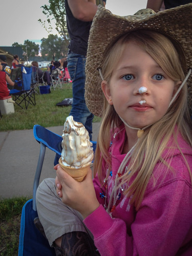 Nora enjoys a cone while waiting for the Shell Lake fireworks • <a style="font-size:0.8em;" href="http://www.flickr.com/photos/96277117@N00/14392019757/" target="_blank">View on Flickr</a>