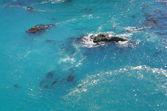 Water swirling in a bluegreen bay (zoom) • <a style="font-size:0.8em;" href="http://www.flickr.com/photos/34843984@N07/15359538279/" target="_blank">View on Flickr</a>