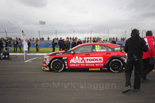 Adam Morgan heads to the grid for race two at the British Touring Car Championship 2017 at Donington Park