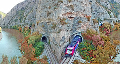 Macedonia & Western Thrace, OSE train in the tunnels along river Nestos gorge past Galani enroute to Stavroupolis, Greece