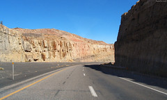 Highway cut thru sandstone • <a style="font-size:0.8em;" href="http://www.flickr.com/photos/34843984@N07/14926515563/" target="_blank">View on Flickr</a>