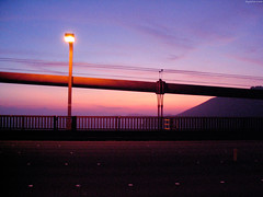 Sun setting behind bridge cables • <a style="font-size:0.8em;" href="http://www.flickr.com/photos/34843984@N07/15522947546/" target="_blank">View on Flickr</a>